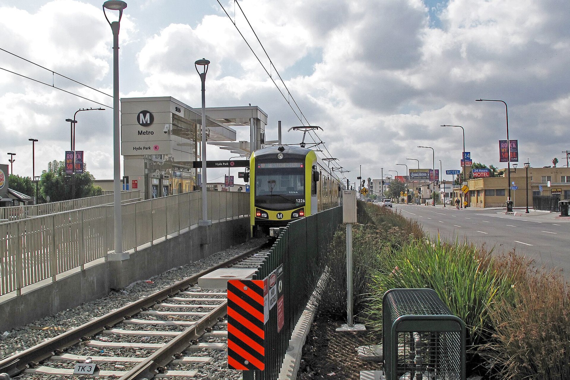 A K Line train at Hyde Park station on Crenshaw Boulevard at Slauson Avenue
