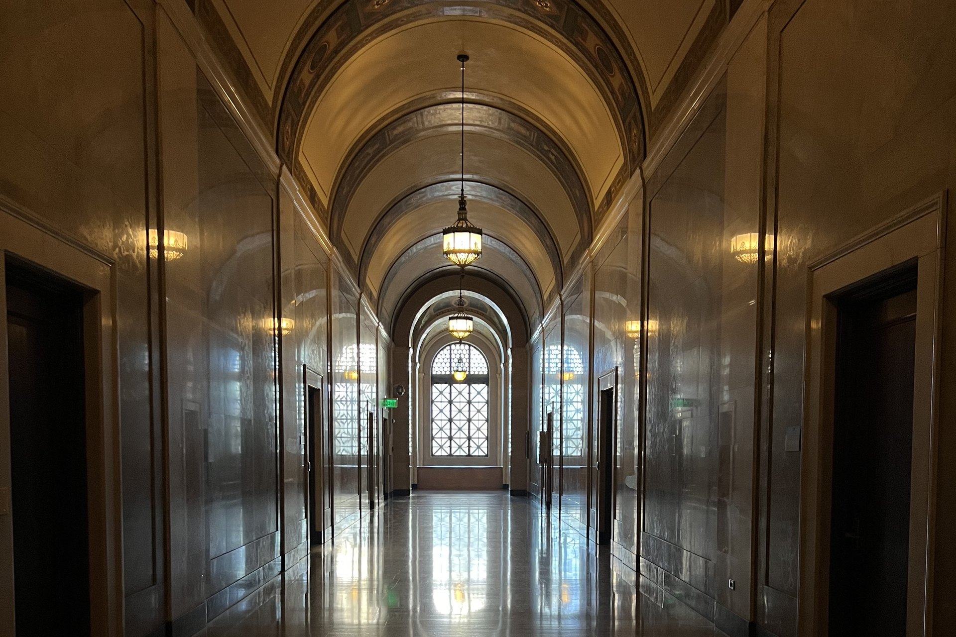 An empty vaulted corridor inside Los Angeles City Hall