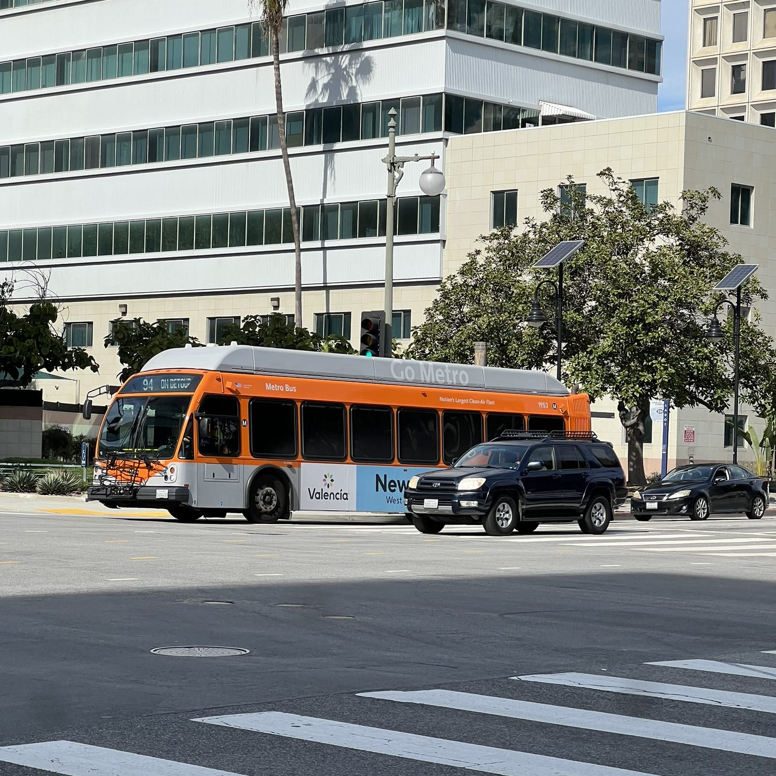 A Metro bus crossing an intersection in Los Angeles